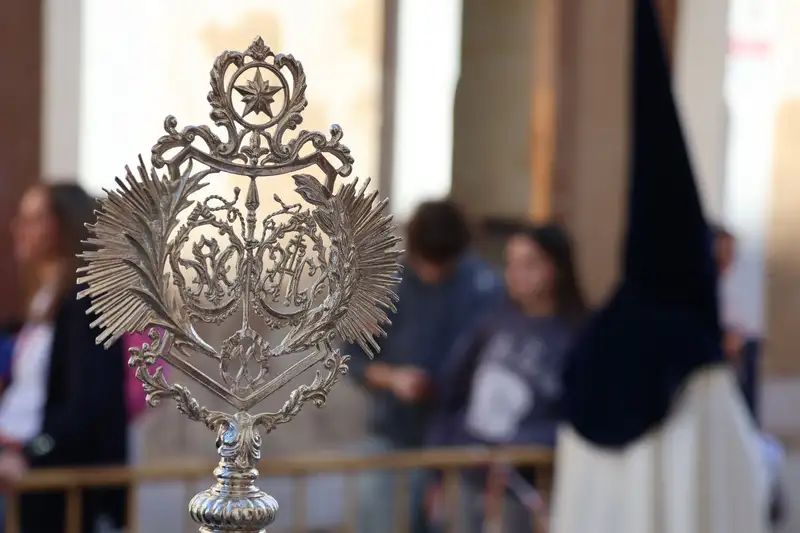 Close-up of an ornate religious symbol during Semana Santa procession in El Puerto de Santa María, Spain.
